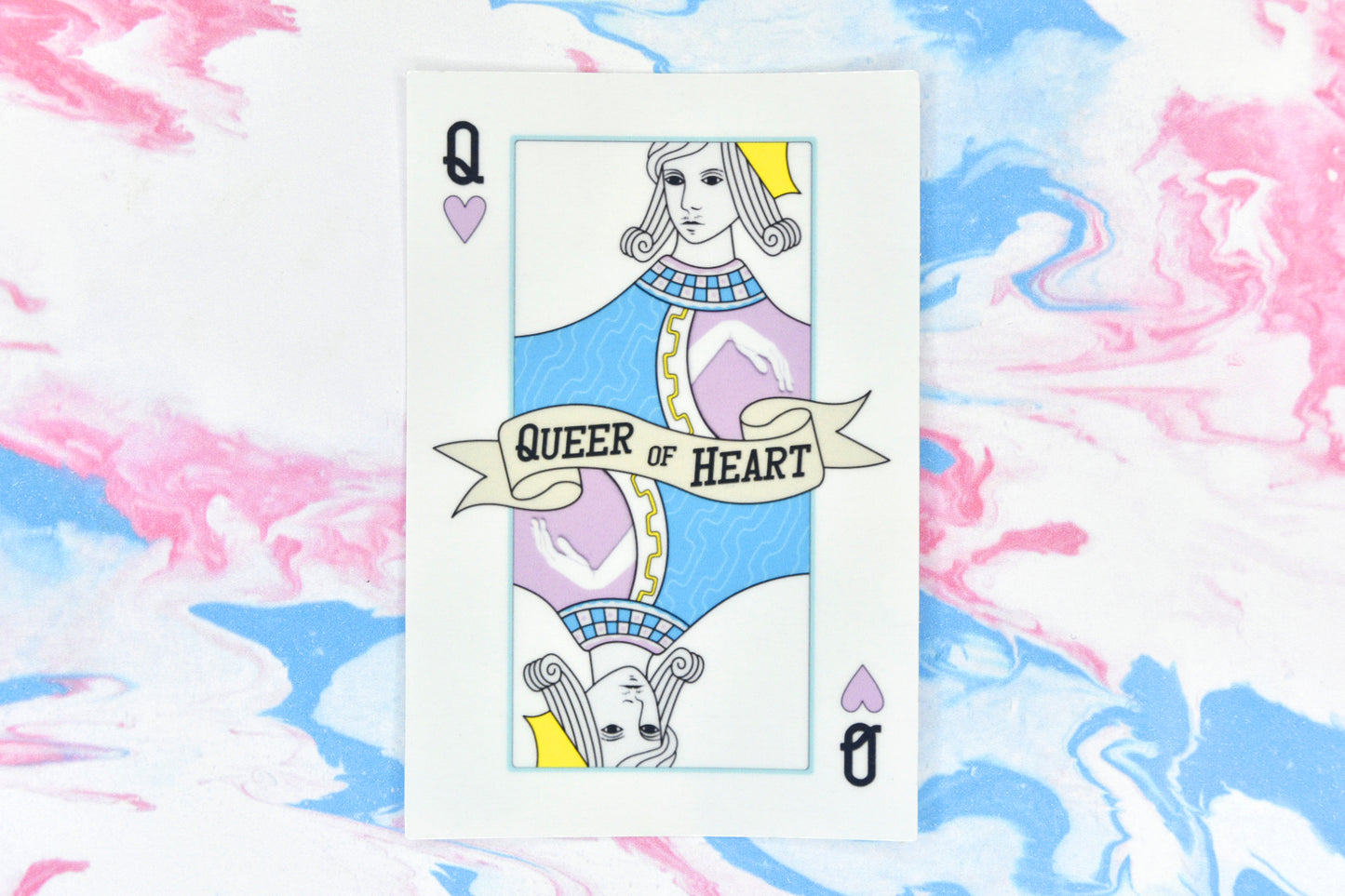 A rectangular LGBTQ+ vinyl sticker featuring a playing card-inspired design with text reading "queer of heart".