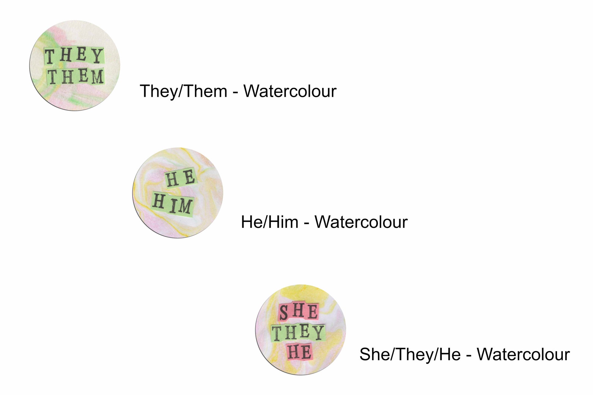 Three pronoun badges, each featuring a pastel watercolour design with pale green, pink and yellow paint pouring patterns. Overlaid are hand cut pieces of coloured paper with hand stamped uppercase black lettering. There is one with green paper reading "they/them", one with green paper reading "he/him", and one with pink and green paper reading "she/they/he". There are labels beside each of the badges with the name of each design which are "pronouns - watercolour".