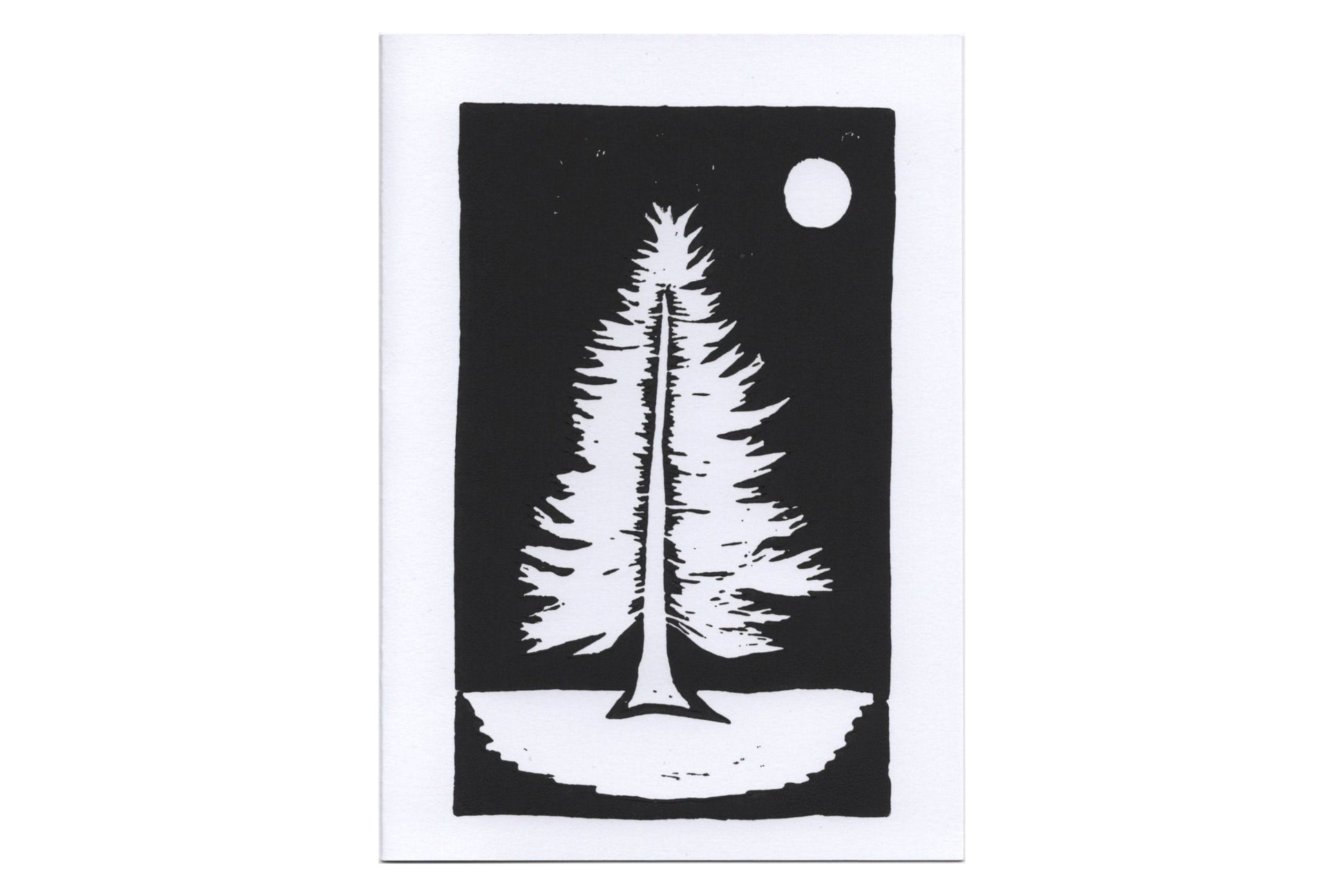 A lino print of a pine tree in black ink on white card.